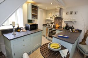 Christina Warwick coach house 2 sm.jpg